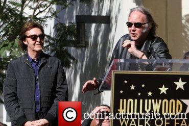 Paul McCartney y Neil Young 2012 MusiCares Person Of The Year, en el Hollywood Hall of Fame